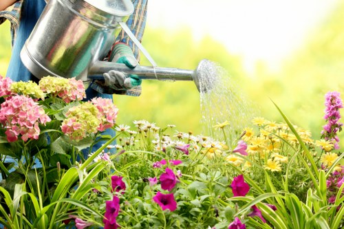 Brentcross backyard landscaping with seating and lawn
